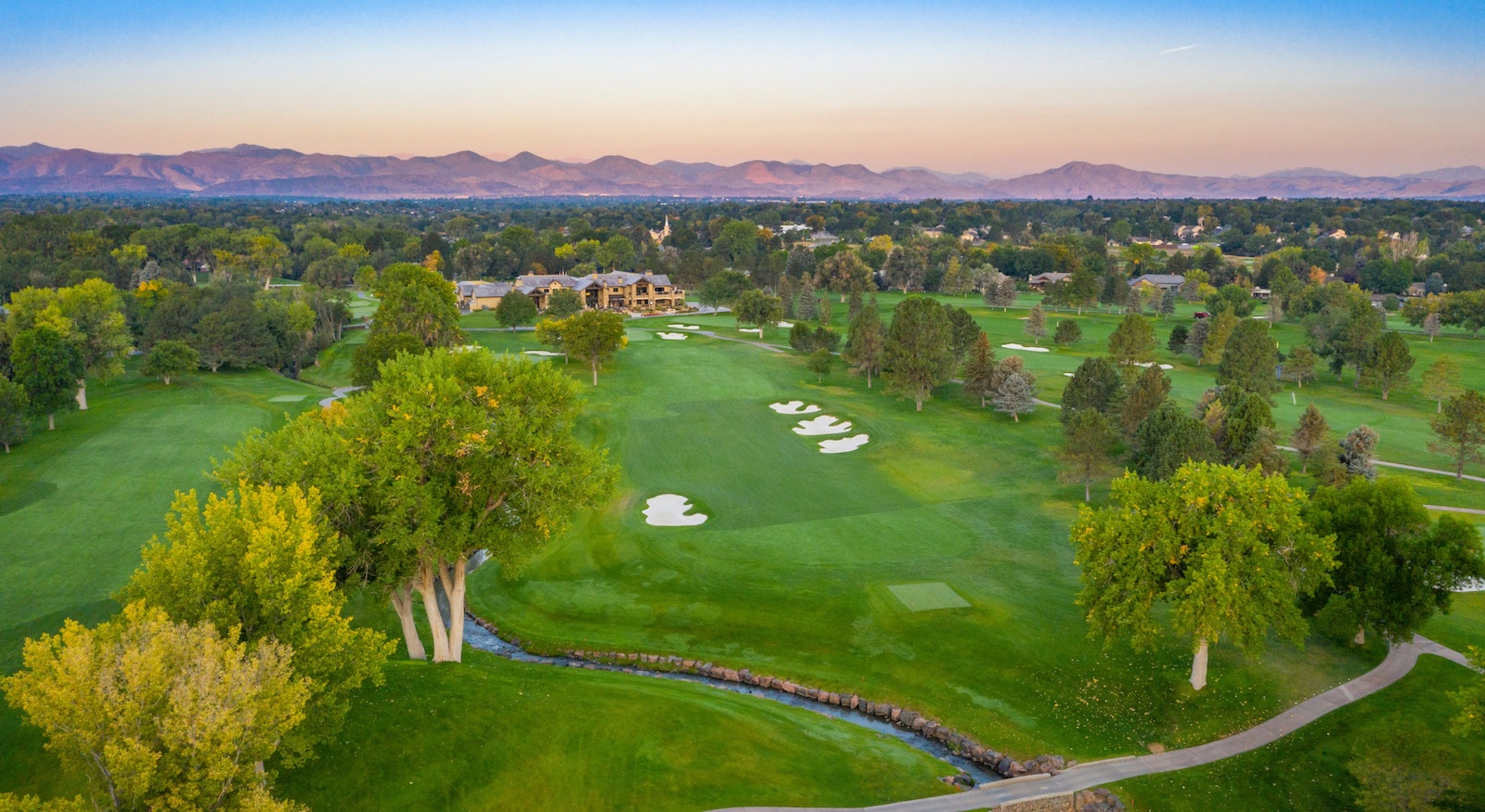 Aerial view of golf course in Columbine Colorado | Thomas Sattler Homes