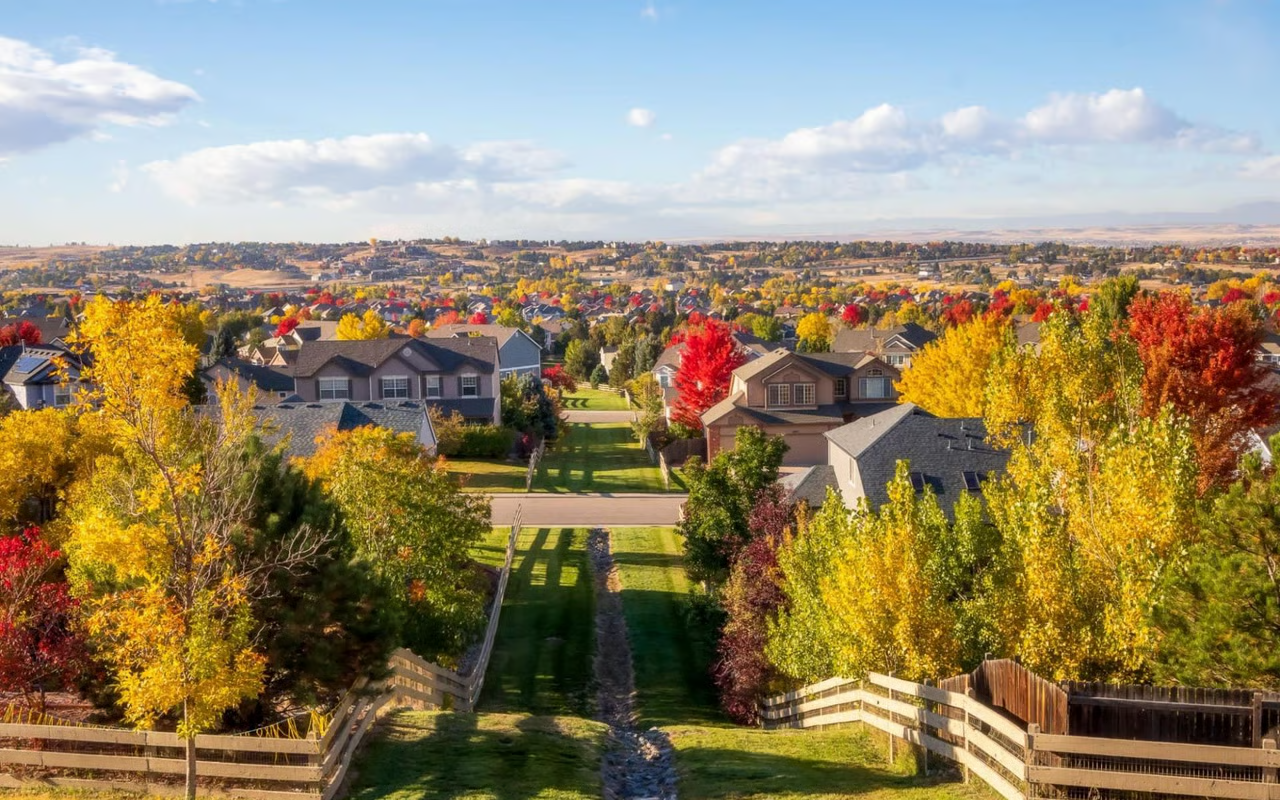 Aerial image of Centennial Colorado in the fall with tree changing colors | Thomas Sattler Homes